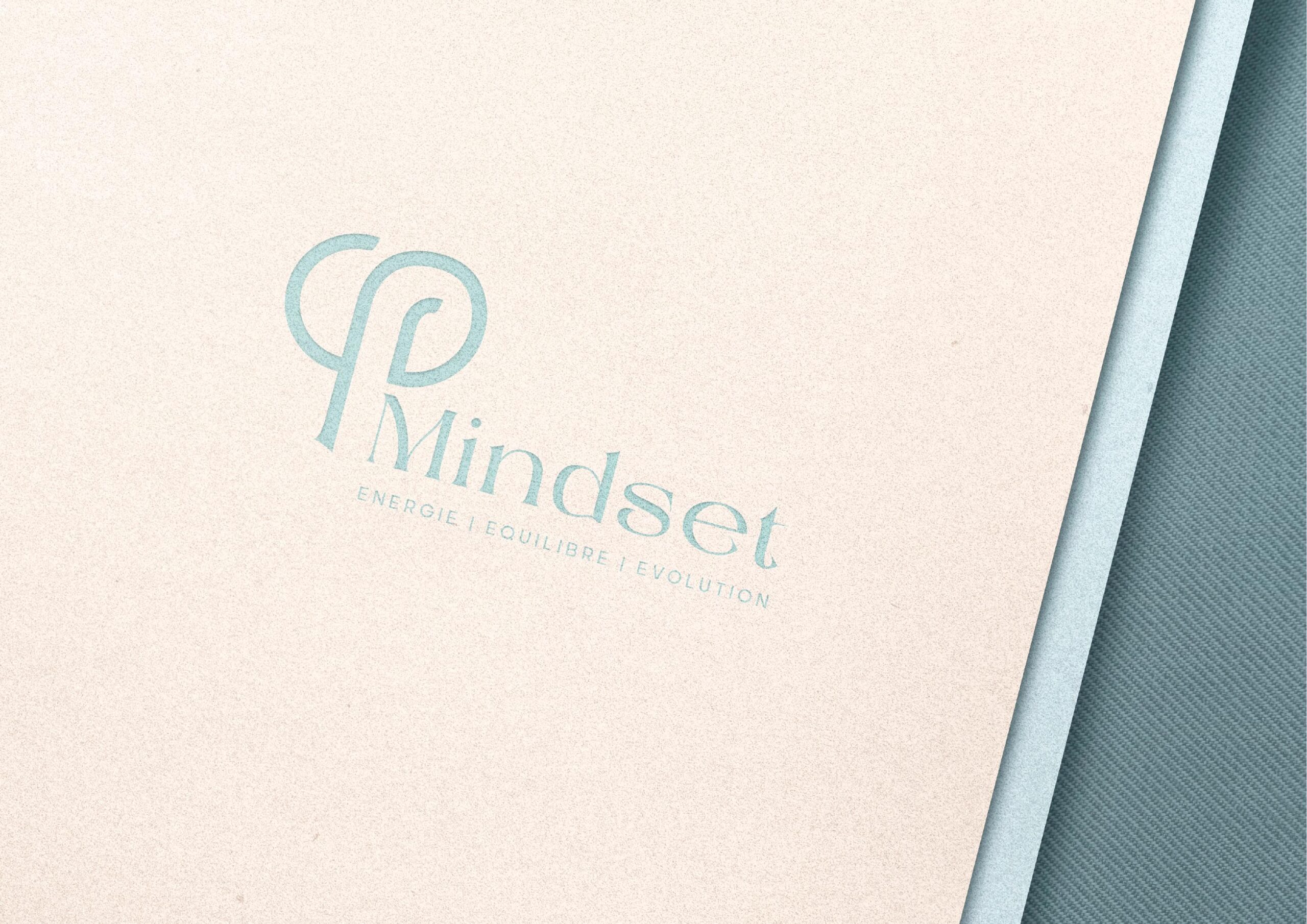 a woman in a black suit holding her head